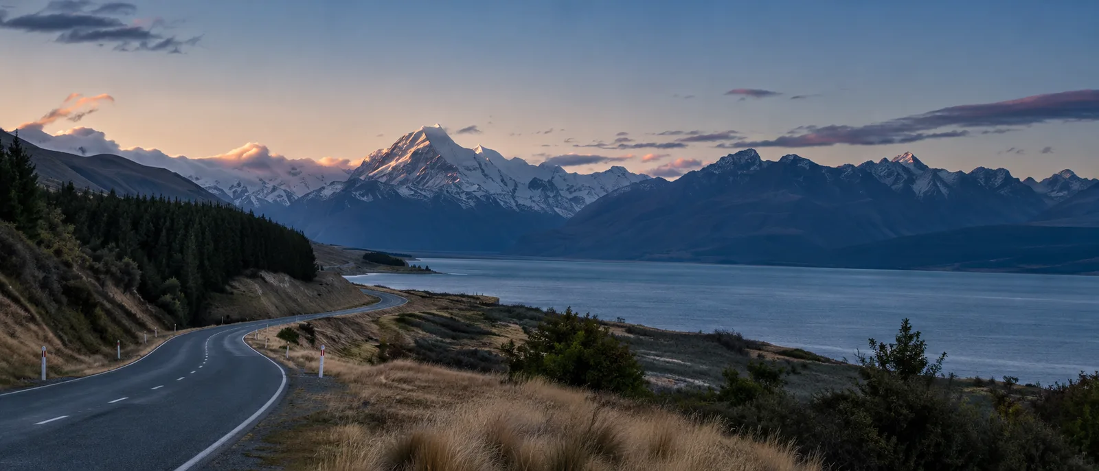 Editorial illustration of a scenic South Island road and mountain landscape